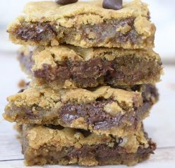 Chewy Chocolate Chip Cookie Bars without a mixer or chilling dough are a staple in my kitchen and once you make them, everyone asks for the recipe. They are a delicious, easy dessert recipe!