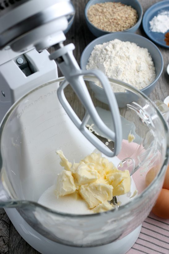 The butter and sugar being blended together is the first step to making the perfect heart shaped cookies!