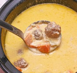 Slow Cooker Cheesy Meatball Soup an easy weeknight dinner recipe the whole family will love. It is a soup recipe that is delicious on a cold winter day!