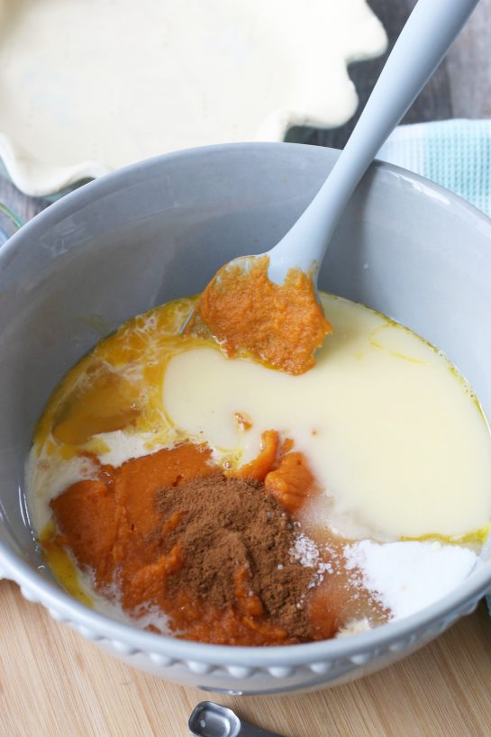 The ingredients for sweet potato pie go into a bowl to be mixed!