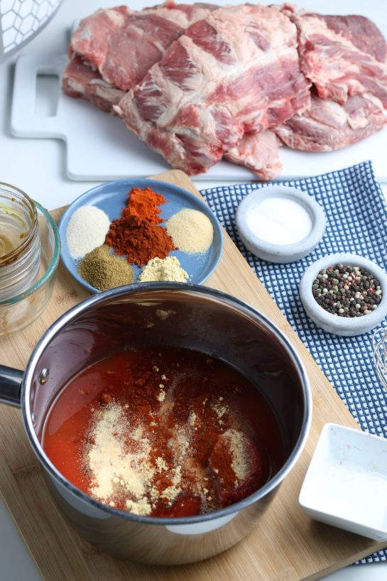 The next step is to add more seasonings to the crock pot ribs so they're extra flavorful!