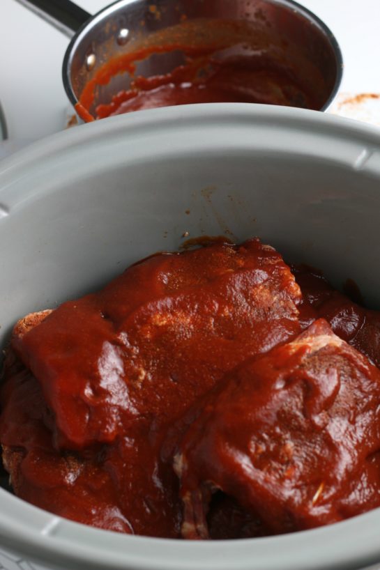 Make sure the ribs are all coated in the slow cooker so that the crock pot ribs recipe stays juicy.