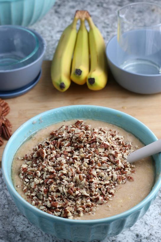 Adding the pecans for the Homemade Hummingbird Cake recipe