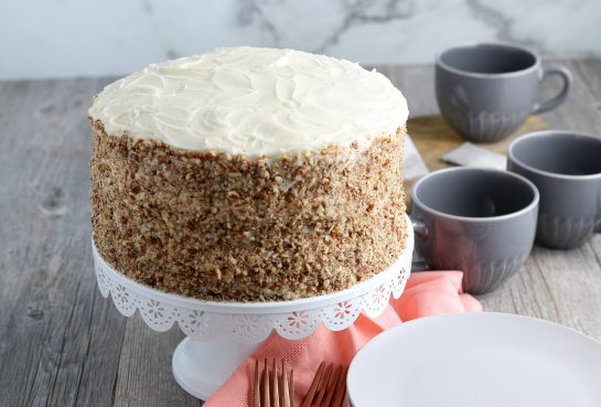 Homemade Hummingbird Cake is a beloved, classic southern cake recipe packed with banana and pineapple that looks so impressive for a holiday or birthday party!