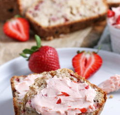 Another view of the sliced bread with strawberry cream cheese on top, ready to be eaten.