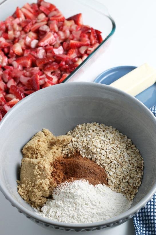 Mixing the dry ingredients for Strawberry & Rhubarb crisp recipe