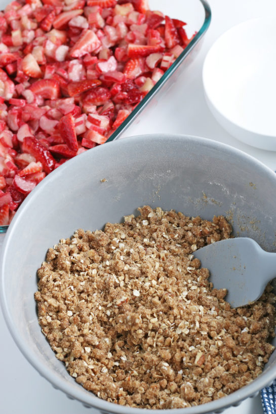 Mixing the crumble topping for Strawberry & Rhubarb crisp dessert recipe