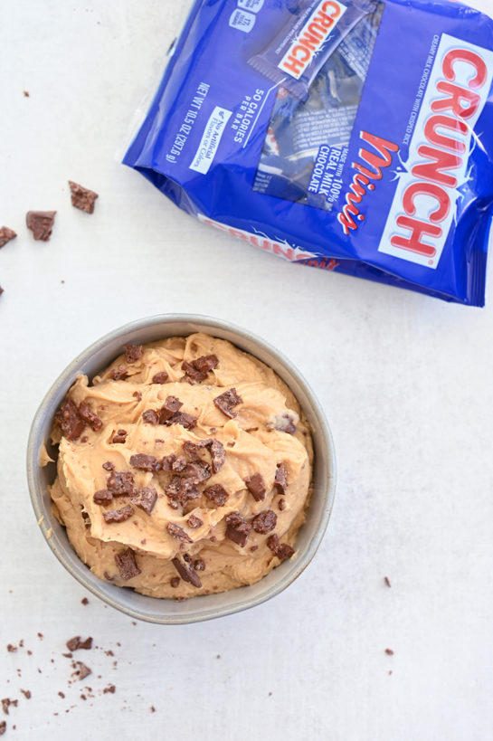Crushed Crunch Minis sprinkled on top of the Peanut Butter Crunch Bar Dip recipe