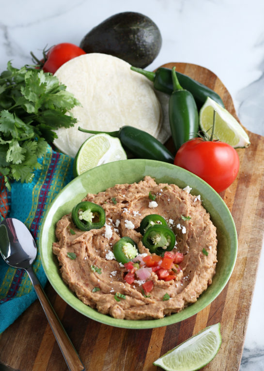 Homemade Refried Beans recipe that is so good you will never go back to store-bought! They check all the boxes for me: lots of flavor, tons of texture, super hearty!