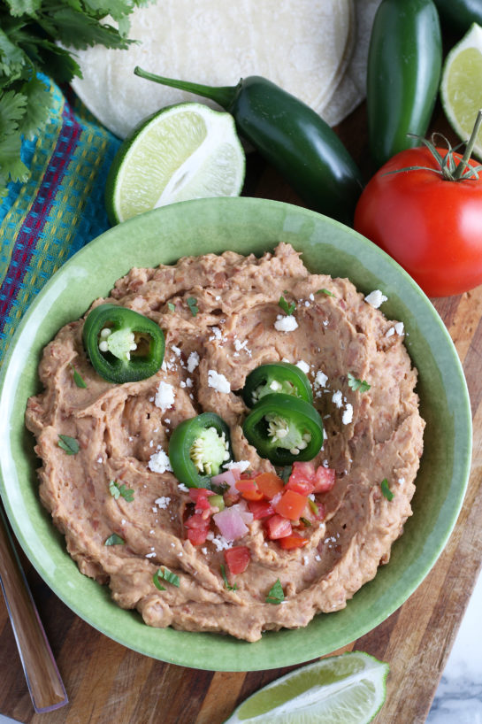 Homemade Refried Beans recipe that is so good you will never go back to store-bought! They check all the boxes for me: lots of flavor, tons of texture, super satisfying. I need nothing else.