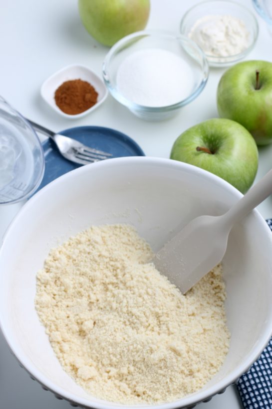 Adding the spices together for the apple crostata recipe