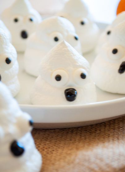 Cute and simple Halloween Boo Meringues are an incredibly fun and easy Halloween recipe for kids for a party! The whole family will love them!