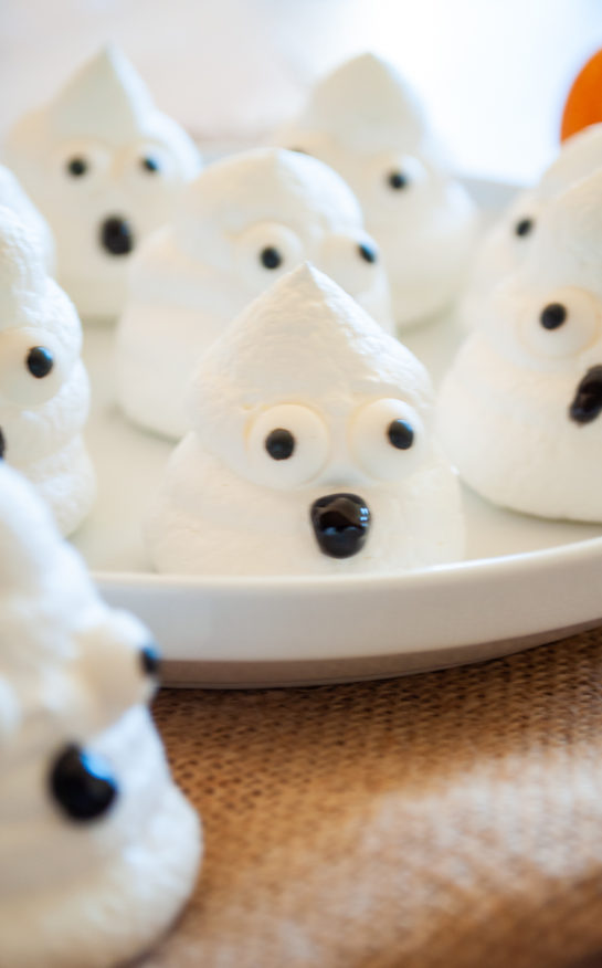 Cute and simple Halloween Boo Meringues are an incredibly fun and easy Halloween recipe for kids for a party! The whole family will love them!