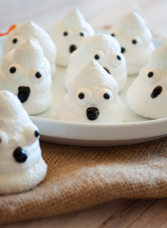 Simple Halloween Boo Meringues are an incredibly fun and easy Halloween recipe for kids for a holiday party! The whole family will love eating them!