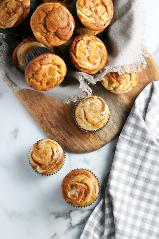 Beautiful Pumpkin Cream Cheese Muffins are a tasty treat for snacking, breakfast, and more. These pumpkin cream cheese swirl muffins are easy to make for a fall, Christmas, or Thanksgiving dessert! 