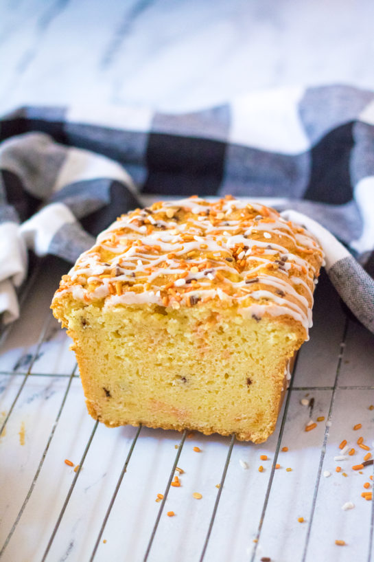 Fall Confetti Sweet Bread recipe is super moist and flavorful. This breakfast or dessert bread is easy to make and doesn’t require a mixer - just a bowl, spatula and bread loaf pan. This is perfect for Thanksgiving or Halloween!