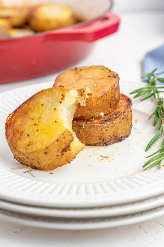 Easy Melting Potatoes recipe might just become your new go-to side dish for Thanksgiving and Christmas! Baking the Russet potatoes in high heat caramelizes the outsides, and finishing them in chicken broth makes the insides creamy!