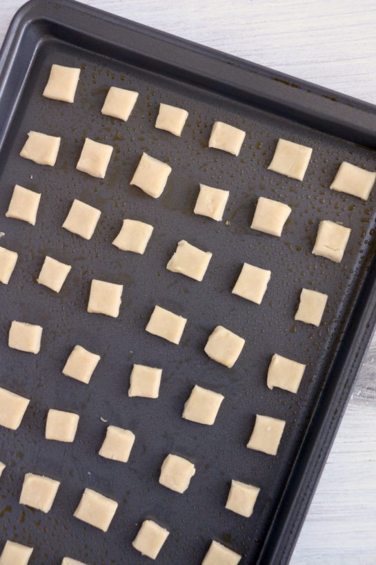 The arranged dough pieces on the baking sheet to make the Christmas Sugar Cookie Bites recipe