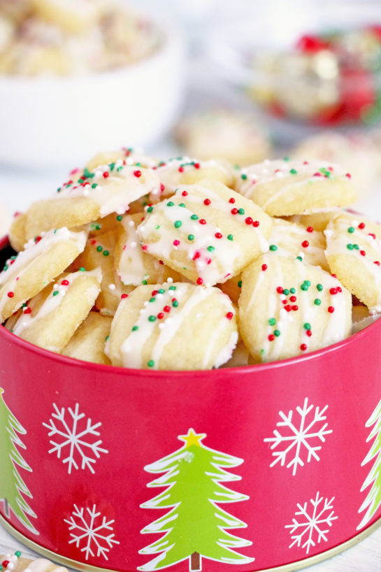 The finished frosted Christmas Sugar Cookie Bites recipe for Christmas cookie trays!