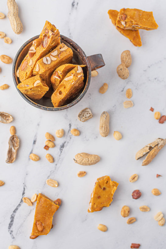 Overhead shot of the completed Microwave Peanut Brittle recipe shown in on the table