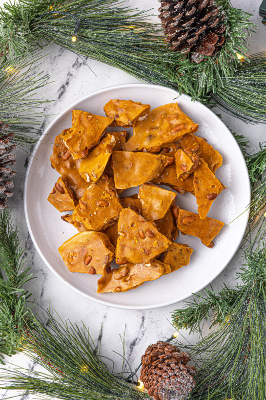 Perfect golden brown Microwave Peanut Brittle recipe is the perfect sweet & salty treat for the holidays with the perfect crunch and sheen! A great edible gift for Christmas!