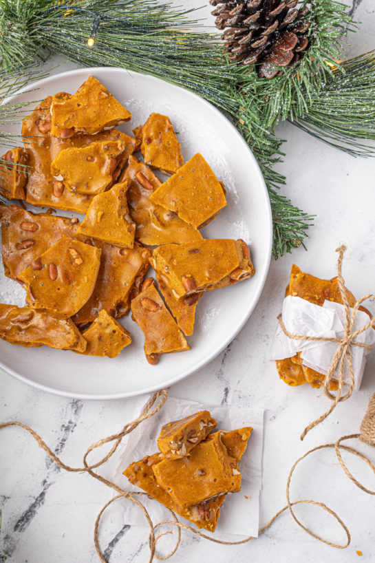 Perfect golden brown Microwave Peanut Brittle recipe is the perfect sweet & salty treat for the holidays with the perfect crunch and sheen! A great edible gift for the holidays!