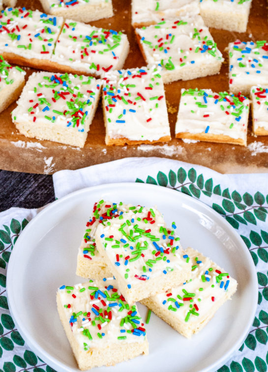 Overhead shot of the Holiday Sugar Cookie Bars cut up and on a plate for serving