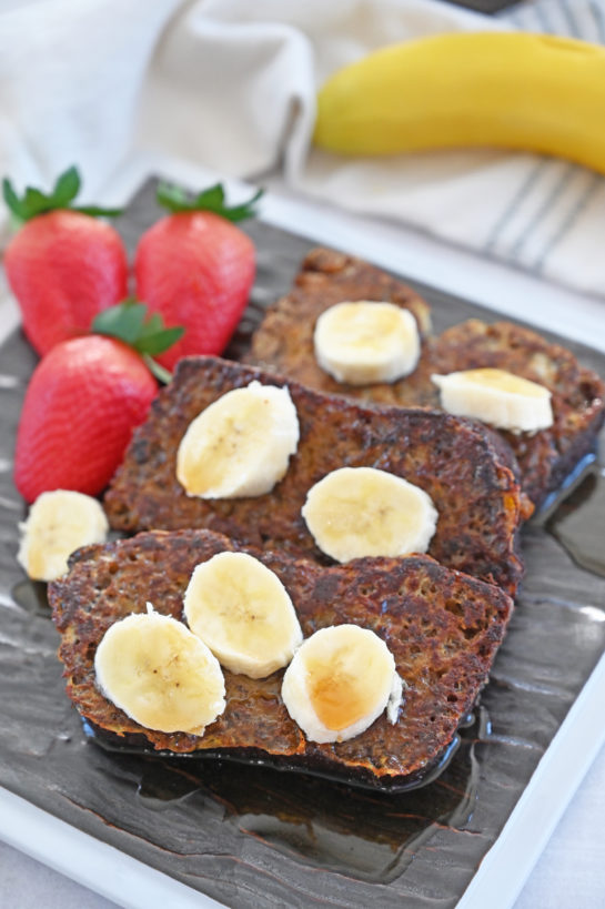 Simple Banana Bread French Toast recipe is a great breakfast or brunch for preparing ahead and it’s loaded with banana flavor! No need to wait for the weekend to enjoy French toast when you can cook up this irresistible banana breakfast!