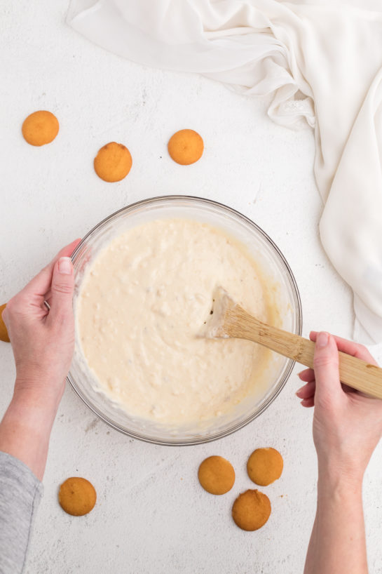 Mixing the wet ingredients with the dry ingredients for the banana pudding pancakes recipe