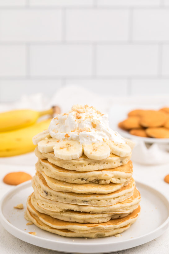 Delicious Banana Pudding Pancakes are flavorful enough you don't even need the syrup! They are a quick and easy breakfast or brunch recipe you will love!