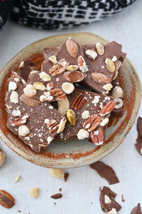 Simple 5-ingredient Salted Chocolate Almond Hazelnut Bark recipe is a beautiful, festive special occasion or holiday dessert that makes for a great edible Christmas gift for family, co-workers, and friends!