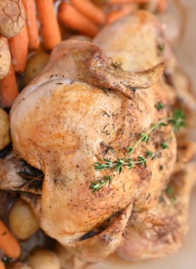 Roasting a whole chicken is easier than you think! This crispy skin roast chicken with vegetables recipe yields a moist, golden bird with savory vegetables that will all be ready to eat at the same time! 