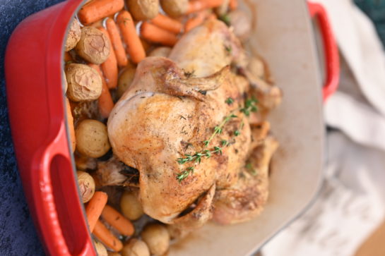 Roasting a chicken is easier than you think! This crispy skin roast chicken with vegetables recipe yields a moist, golden bird with savory vegetables that will all be ready to eat at the same time! 