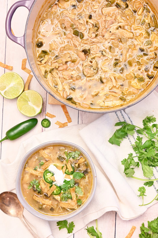 Comforting White Chicken Chili recipe flavorful blend of tender chicken, white beans and just enough spice! This is my new favorite chili recipe for game day, holiday, or cold winter day!