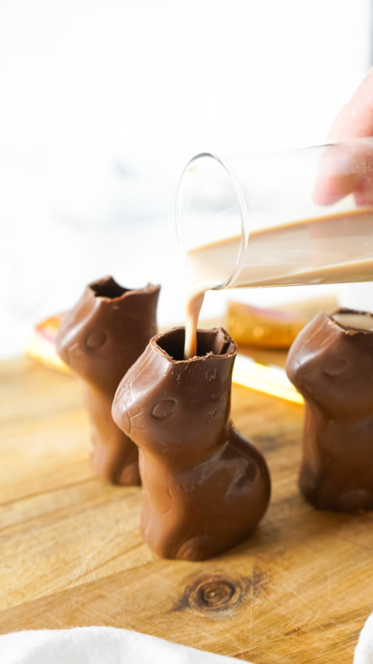 Photo of Bailey's being poured into the bunny to make Bailey’s Chocolate Bunny Cocktail recipe