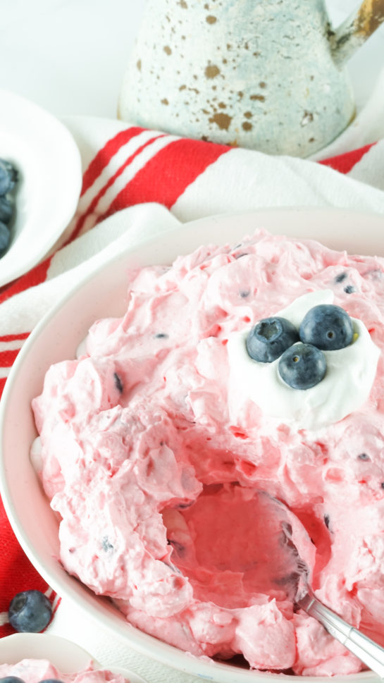 Patriotic Red White and Blue Fluff Salad recipe is a delicious dump and go dessert salad or side dish idea that is perfect for any and all occasions! This is such an easy dessert to bring to parties, picnics, and potlucks. 