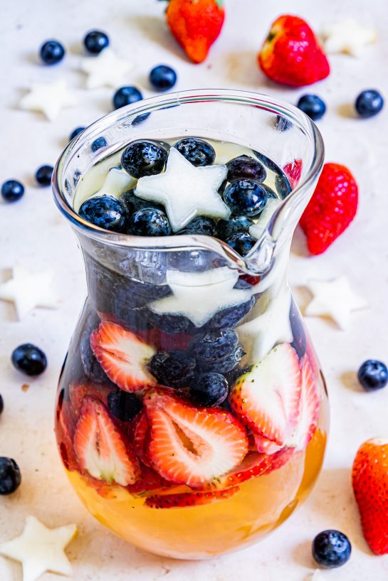 Photo of the pitcher of Patriotic Sangria recipe ready to serve for the fourth of July