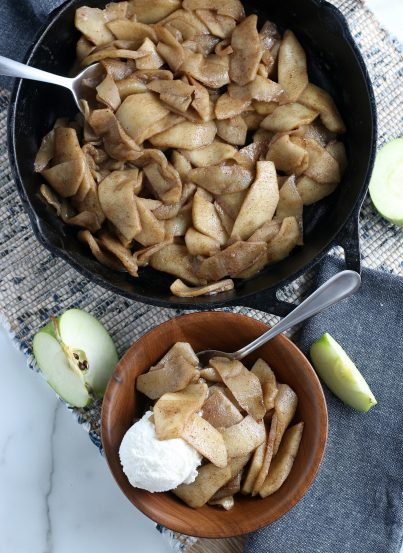 Easy Fried Apples are fresh apple wedges cooked up in butter, sugar and cinnamon until soft and browned. An easy side dish or dessert option for the fall or Thanksgiving that always gets rave reviews!
