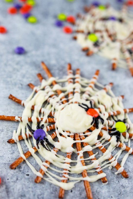Close-up photo of the Spooky Halloween Chocolate Pretzel Spider Webs recipe for a party