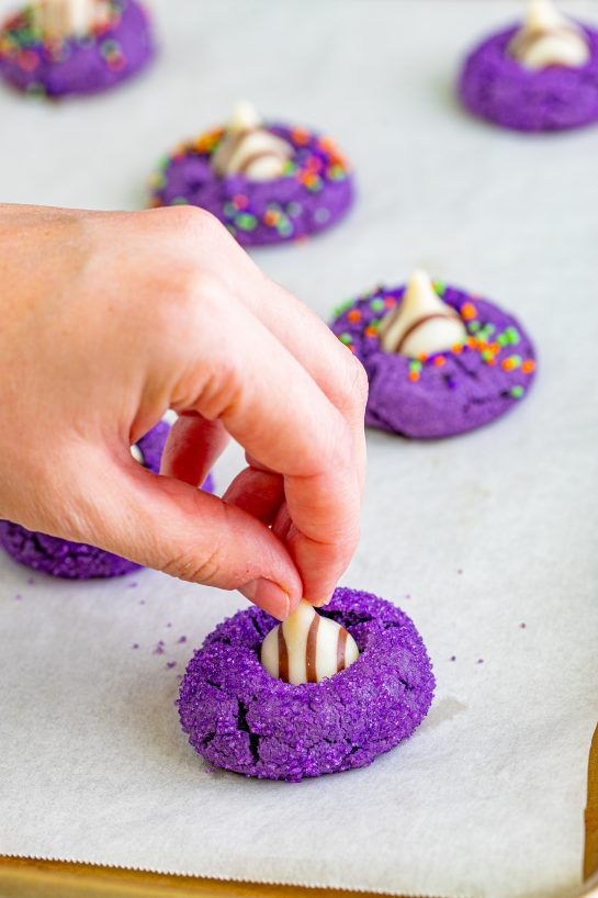 These Halloween Witch Hat Cookies are the perfect dessert recipe for Halloween! They are both spooky (in a totally adorable way), super delicious, and great Halloween cookies to make with kids.