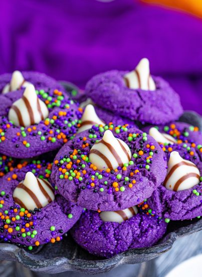 These Halloween Witch Hat Cookies are the perfect dessert recipe for Halloween! They are both spooky (in a totally adorable way), super delicious, and great Halloween cookies to make with kids (big or small).