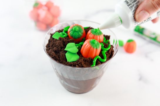 Close-up of the finished pumpkin patch dirt cups recipe