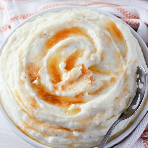 Traditional, creamy Amish Mashed Potatoes will be your favorite mashed potatoes ever and best Thanksgiving or Christmas dinner side dish! The browned butter makes all the difference and these are packed with delicious flavor!