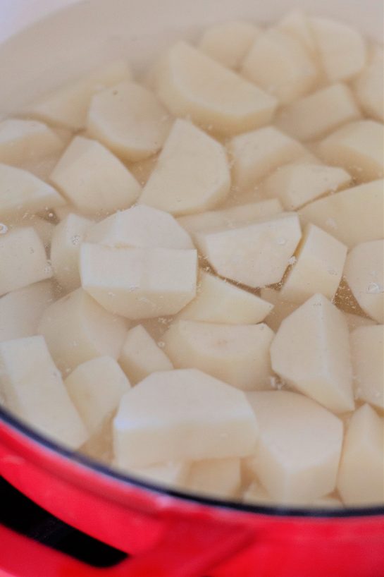 Boiling the potatoes for Amish mashed potatoes recipe