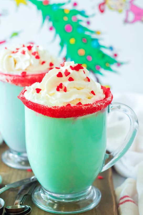 Festive Grinch Hot Chocolate recipe that is the perfect combination of creamy, smooth hot chocolate and green Grinch fun for Christmas. Kids and adults will love it!