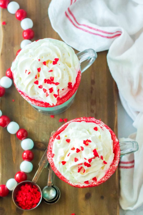 Overheard shot of the Grinch Hot Chocolate recipe that is the perfect combination of creamy, smooth hot chocolate and green Grinch fun for Christmas. Kids and adults will love it!