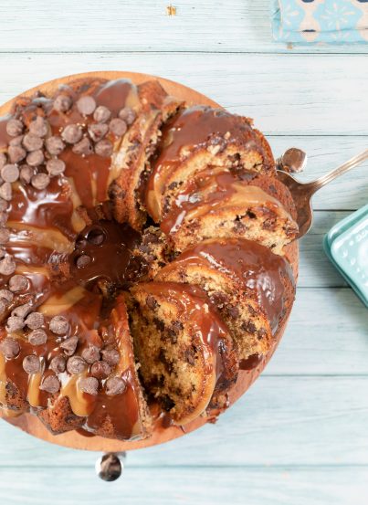 Peanut Butter Chocolate Chip Bundt Cake recipe is super easy and delicious cake that always pleases! The cake always comes out moist and is a combination of salty and sweet!