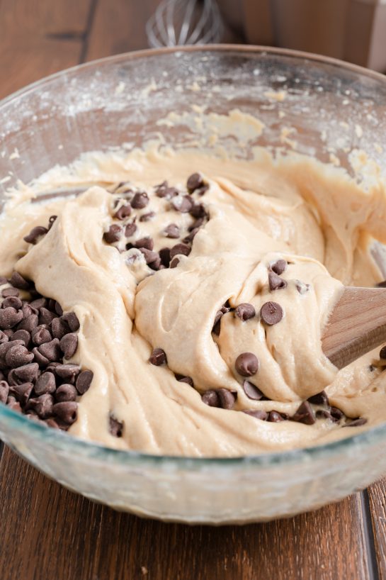 Mixing the chocolate chips in to make the Peanut Butter Chocolate Chip Bundt Cake recipe