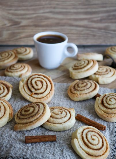 Cinnamon Roll Cookies are thick, soft, buttery cookies, swirled with cinnamon sugar and the perfect Christmas cookie! All the flavors of a cinnamon roll in an amazing cookie recipe!