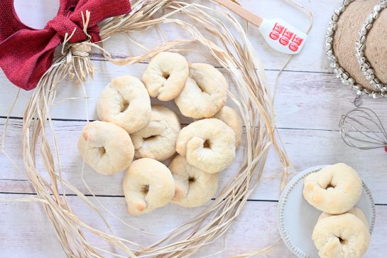 Italian Wine Cookies (Ciambelle al Vino) recipe are a perfect addition to your holiday cookie trays These cookies are light, crunchy, easy to make and made with wine. These are great dipped in coffee or tea!